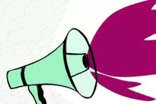 aus einem Megafon springen Flammen hervor